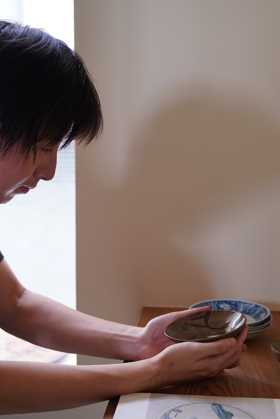 鑑定する田附 時文